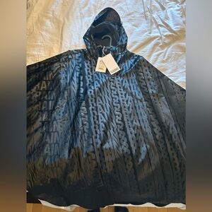 NWT Rains poncho Size M